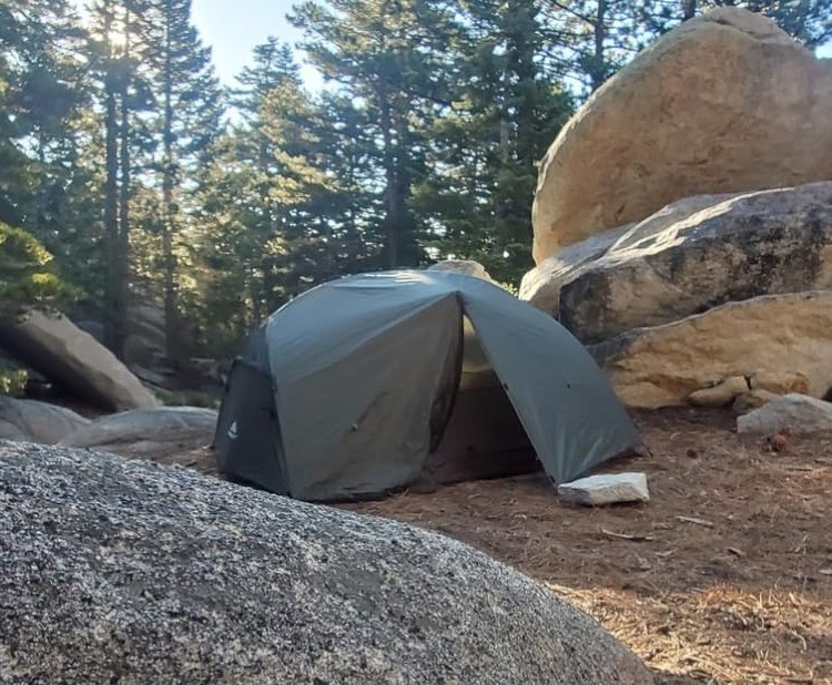 2-person camping tent with rainfly and stakes